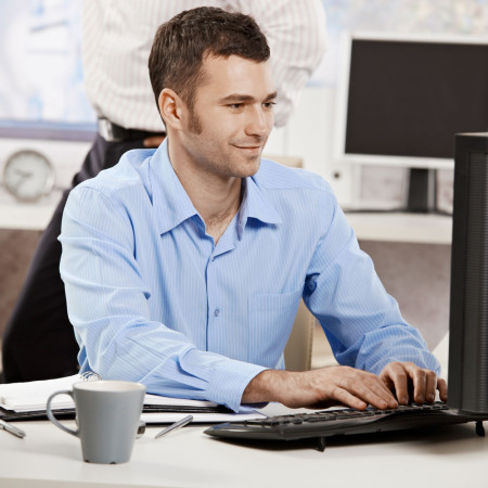 Business man looking at computer